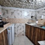 کمال زارع سوئیت بومگردی صخره ای عمارت سنگی کندوان